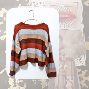 orange, blue, brown striped high neck sweater